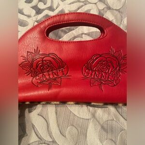 Liz De Ville Saint/Sinner red hand bag